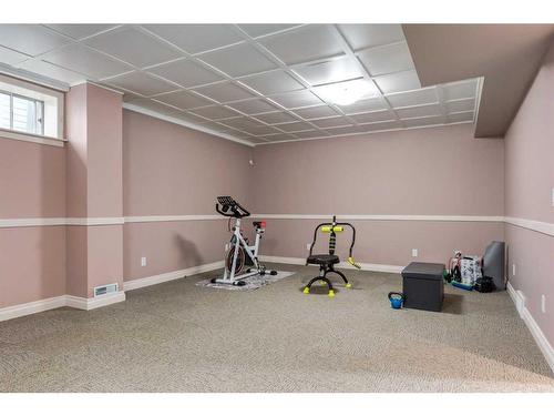 110 Invermere Drive, Chestermere, AB - Indoor Photo Showing Gym Room