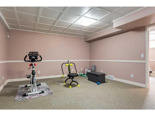 110 Invermere Drive, Chestermere, AB - Indoor Photo Showing Gym Room