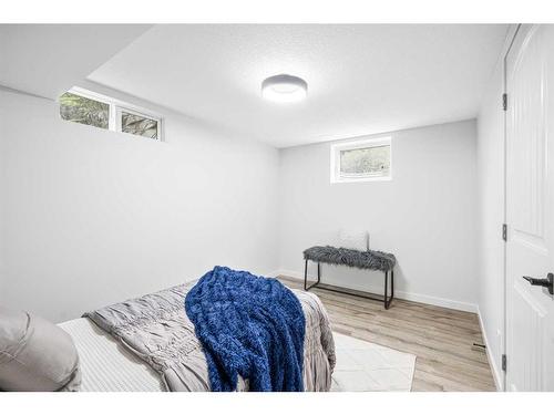 9836 Alcott Road Se, Calgary, AB - Indoor Photo Showing Bedroom