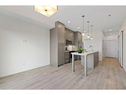 1404-76 Cornerstone Passage Ne, Calgary, AB - Indoor Photo Showing Kitchen With Upgraded Kitchen