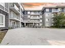 1404-76 Cornerstone Passage Ne, Calgary, AB  - Outdoor With Balcony With Facade 