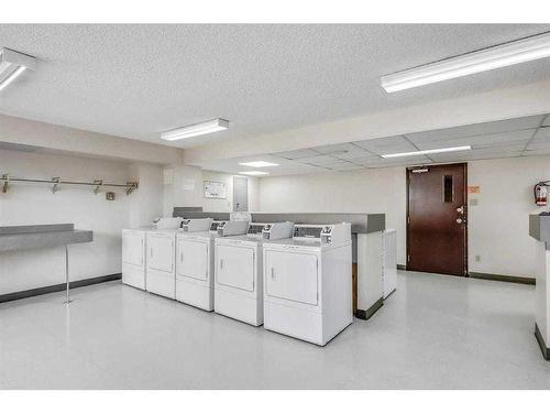 1001-924 14 Avenue Sw, Calgary, AB - Indoor Photo Showing Laundry Room