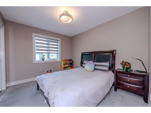 105 Carringvue Manor Nw, Calgary, AB - Indoor Photo Showing Bedroom