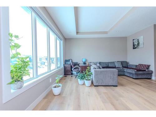 105 Carringvue Manor Nw, Calgary, AB - Indoor Photo Showing Living Room