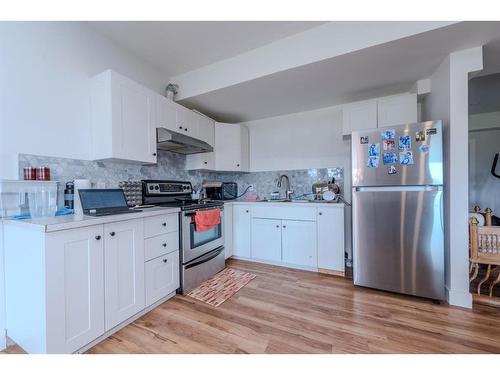 105 Carringvue Manor Nw, Calgary, AB - Indoor Photo Showing Kitchen