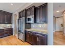 105 Carringvue Manor Nw, Calgary, AB  - Indoor Photo Showing Kitchen 