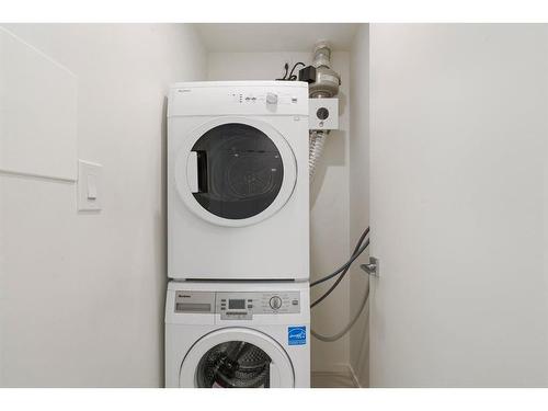 511-1020 9 Avenue Se, Calgary, AB - Indoor Photo Showing Laundry Room