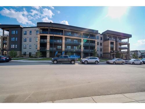 301-55 Wolf Hollow Crescent Se, Calgary, AB - Outdoor With Balcony With Facade