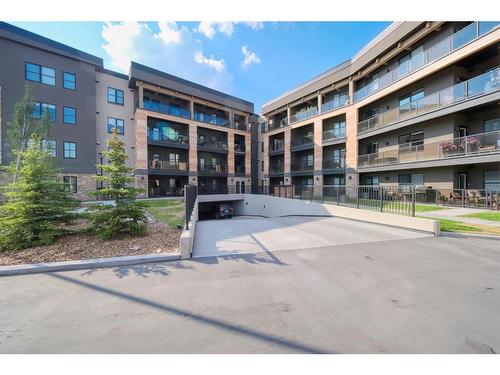 301-55 Wolf Hollow Crescent Se, Calgary, AB - Outdoor With Balcony With Facade