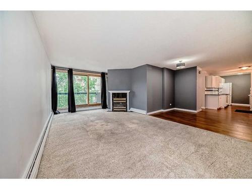 305-323 13 Avenue Sw, Calgary, AB - Indoor With Fireplace