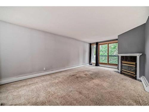 305-323 13 Avenue Sw, Calgary, AB - Indoor With Fireplace