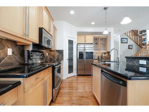 36 Ypres Way Sw, Calgary, AB - Indoor Photo Showing Kitchen With Stainless Steel Kitchen With Upgraded Kitchen