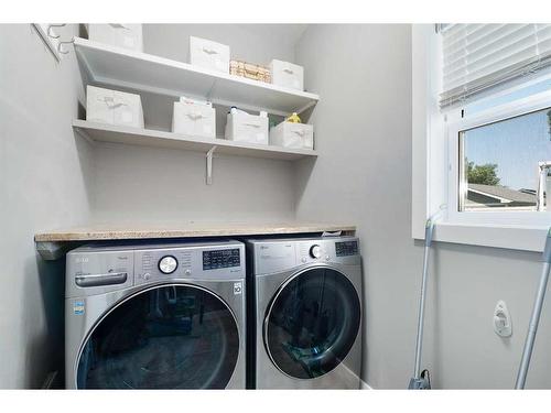 36 Ypres Way Sw, Calgary, AB - Indoor Photo Showing Laundry Room