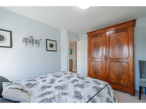 36 Ypres Way Sw, Calgary, AB - Indoor Photo Showing Bedroom