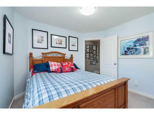 36 Ypres Way Sw, Calgary, AB - Indoor Photo Showing Bedroom