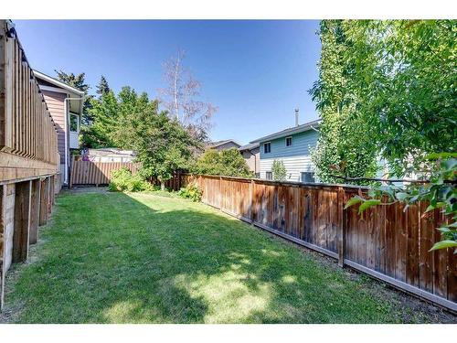 96 Coach Manor Terrace Sw, Calgary, AB - Outdoor With Backyard