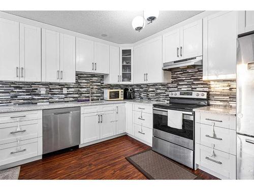 288 Whitewood Place Ne, Calgary, AB - Indoor Photo Showing Kitchen With Upgraded Kitchen