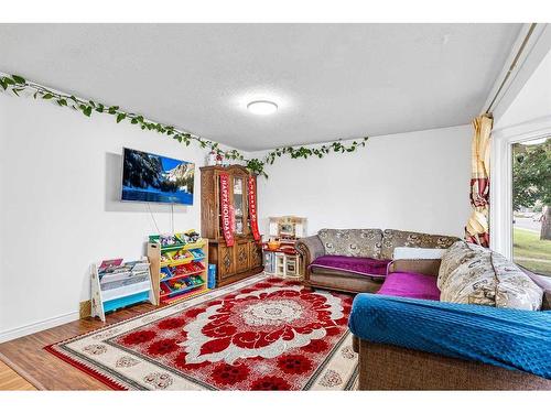 288 Whitewood Place Ne, Calgary, AB - Indoor Photo Showing Living Room