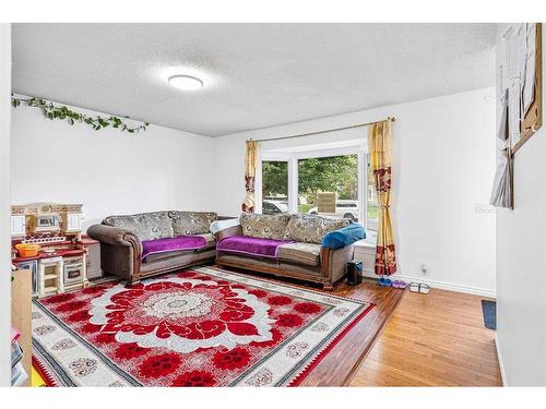 288 Whitewood Place Ne, Calgary, AB - Indoor Photo Showing Living Room