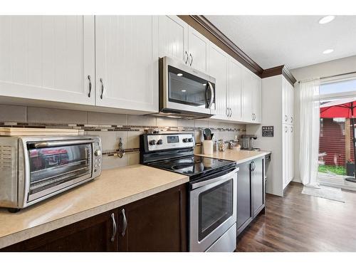 19 Cranford Close Se, Calgary, AB - Indoor Photo Showing Kitchen With Upgraded Kitchen