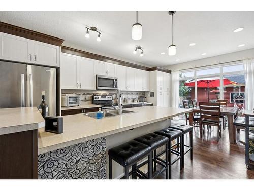 19 Cranford Close Se, Calgary, AB - Indoor Photo Showing Kitchen With Double Sink