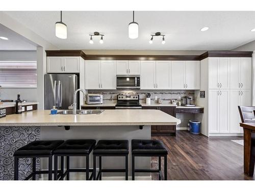 19 Cranford Close Se, Calgary, AB - Indoor Photo Showing Kitchen With Double Sink With Upgraded Kitchen