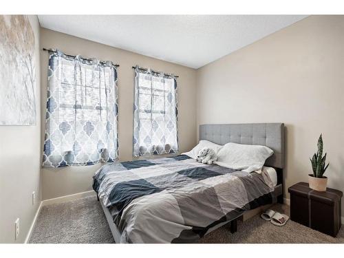 19 Cranford Close Se, Calgary, AB - Indoor Photo Showing Bedroom