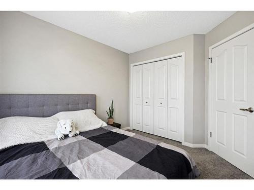 19 Cranford Close Se, Calgary, AB - Indoor Photo Showing Bedroom