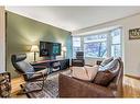 50 Hidden Ranch Circle Nw, Calgary, AB  - Indoor Photo Showing Living Room 