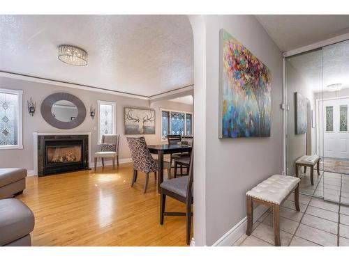 1809 18 Avenue Nw, Calgary, AB - Indoor Photo Showing Living Room With Fireplace