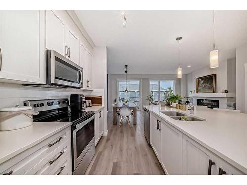 280 Sage Bluff Rise Nw, Calgary, AB - Indoor Photo Showing Kitchen With Double Sink With Upgraded Kitchen