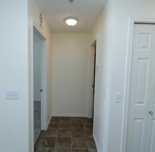 206-1010 Railway Street, Crossfield, AB - Indoor Photo Showing Other Room