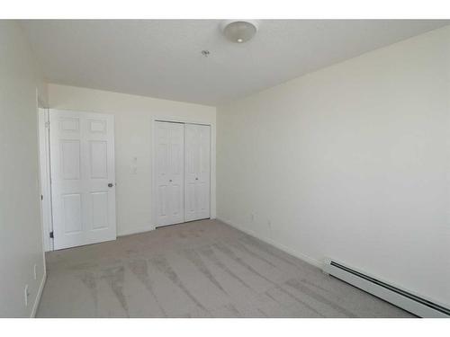 206-1010 Railway Street, Crossfield, AB - Indoor Photo Showing Other Room