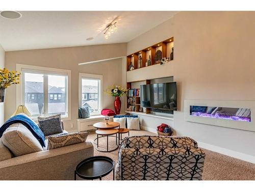 1245 Coopers Drive Sw, Airdrie, AB - Indoor Photo Showing Living Room