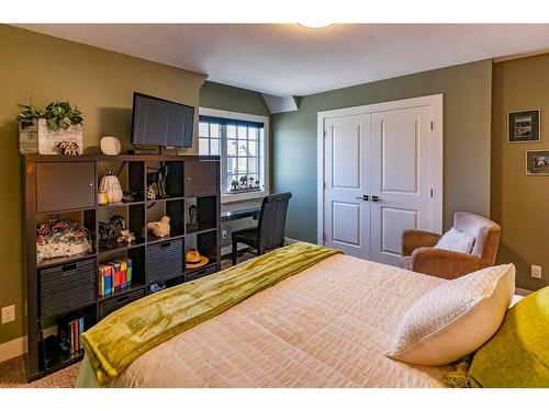 1245 Coopers Drive Sw, Airdrie, AB - Indoor Photo Showing Bedroom