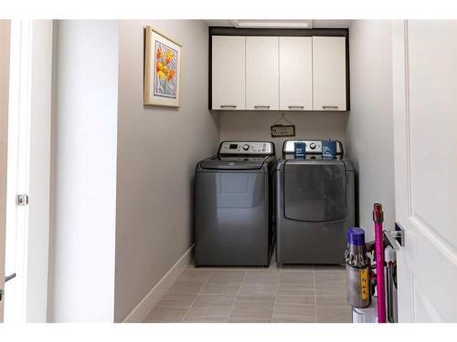 1245 Coopers Drive Sw, Airdrie, AB - Indoor Photo Showing Laundry Room