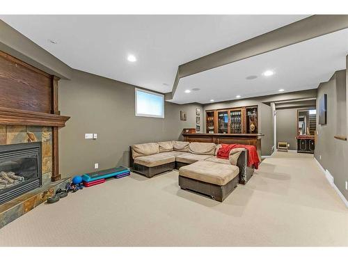 85 Royal Crest Terrace Nw, Calgary, AB - Indoor Photo Showing Basement With Fireplace