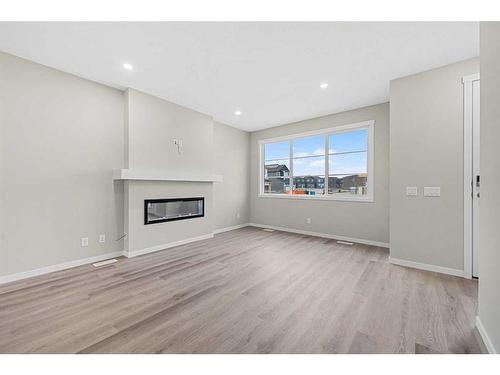 45 Corner Glen Way Ne, Calgary, AB - Indoor Photo Showing Living Room With Fireplace