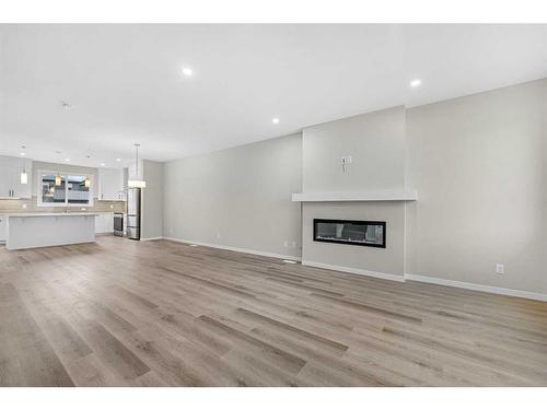 45 Corner Glen Way Ne, Calgary, AB - Indoor Photo Showing Living Room With Fireplace