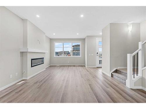 45 Corner Glen Way Ne, Calgary, AB - Indoor With Fireplace