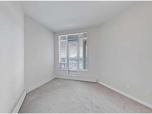 309-1718 14 Avenue Nw, Calgary, AB - Indoor Photo Showing Other Room