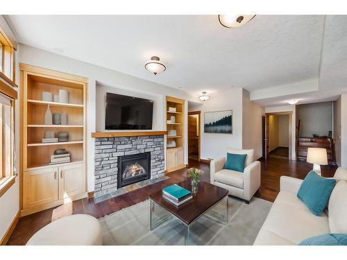 105 Riva Court, Canmore, AB - Indoor Photo Showing Living Room With Fireplace