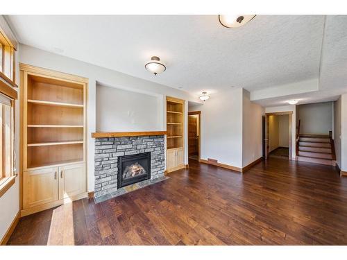 105 Riva Court, Canmore, AB - Indoor Photo Showing Living Room With Fireplace