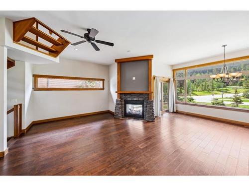 105 Riva Court, Canmore, AB - Indoor Photo Showing Other Room With Fireplace