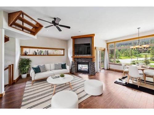 105 Riva Court, Canmore, AB - Indoor Photo Showing Living Room With Fireplace