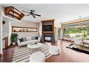 105 Riva Court, Canmore, AB  - Indoor Photo Showing Living Room With Fireplace 