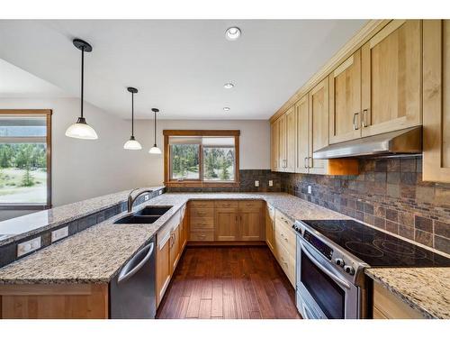 105 Riva Court, Canmore, AB - Indoor Photo Showing Kitchen With Double Sink