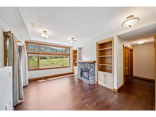 105 Riva Court, Canmore, AB - Indoor With Fireplace