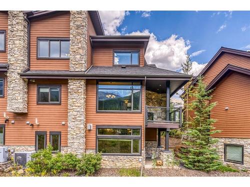 105 Riva Court, Canmore, AB - Outdoor With Facade