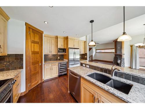 105 Riva Court, Canmore, AB - Indoor Photo Showing Kitchen With Double Sink With Upgraded Kitchen